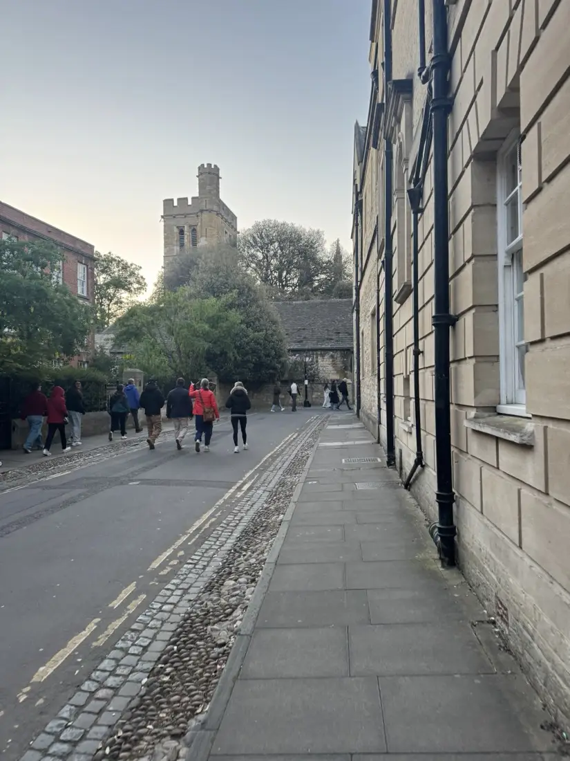 Magpie Lane in pre-dawn light looking toward Magdalen Tower, May Morning 2026